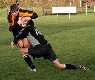 Gavin Lynch takes a hit...