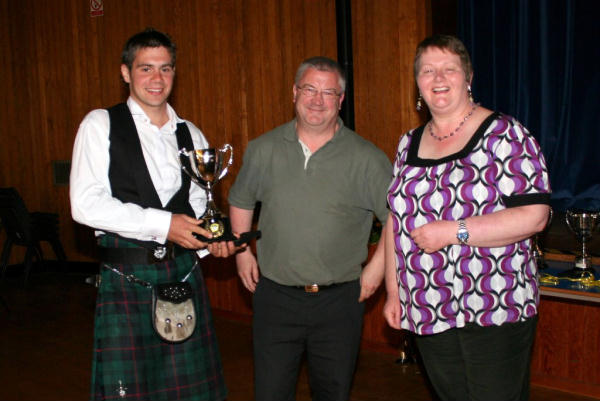 2nd XV Players's Player of the Year David Wyllie presented by Magnox North representatives Frankie McGowan & Mary Graham