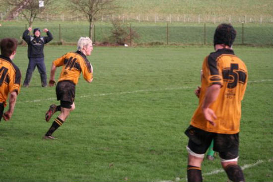Alex Halliday scores - Coach White looks pleased