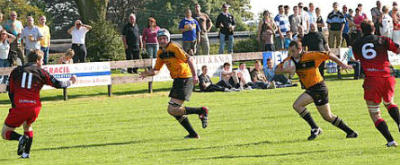 Craig McCann about to set up Graham Smith's try